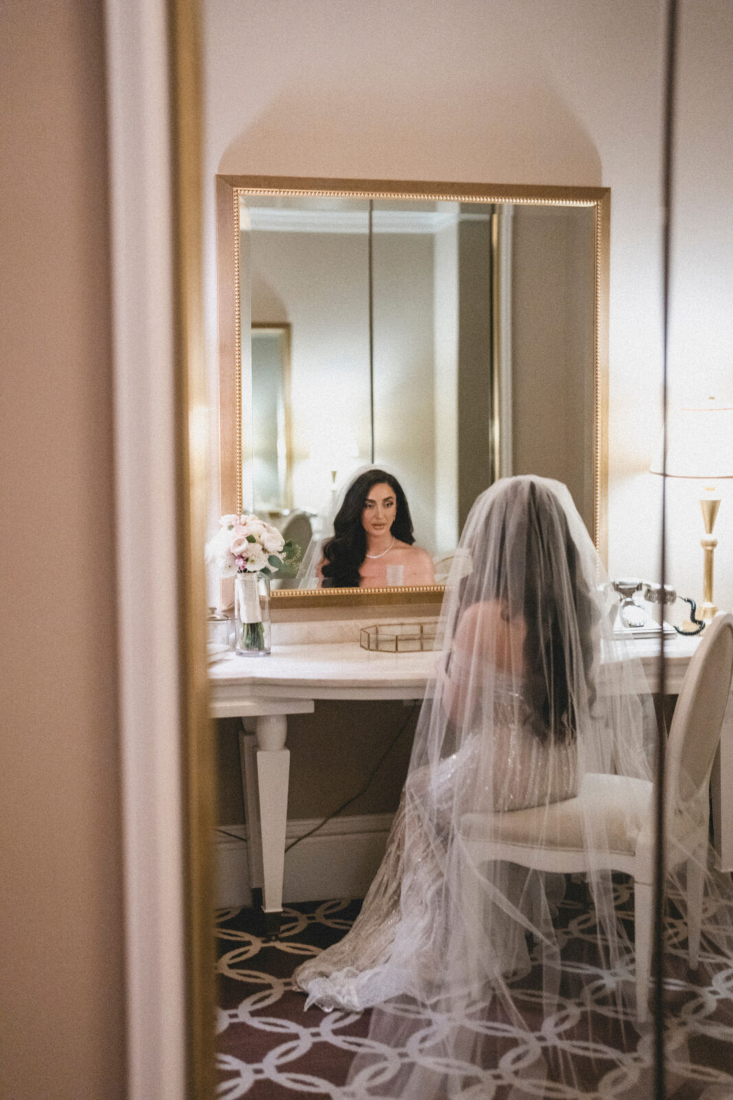 bride staring at the mirror