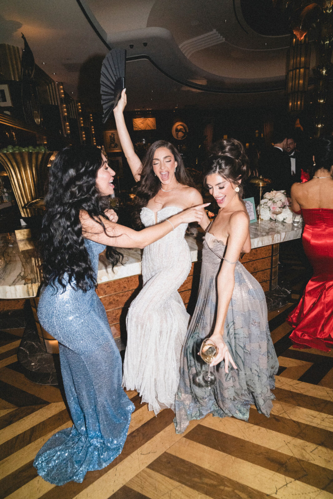 bride dancing with family