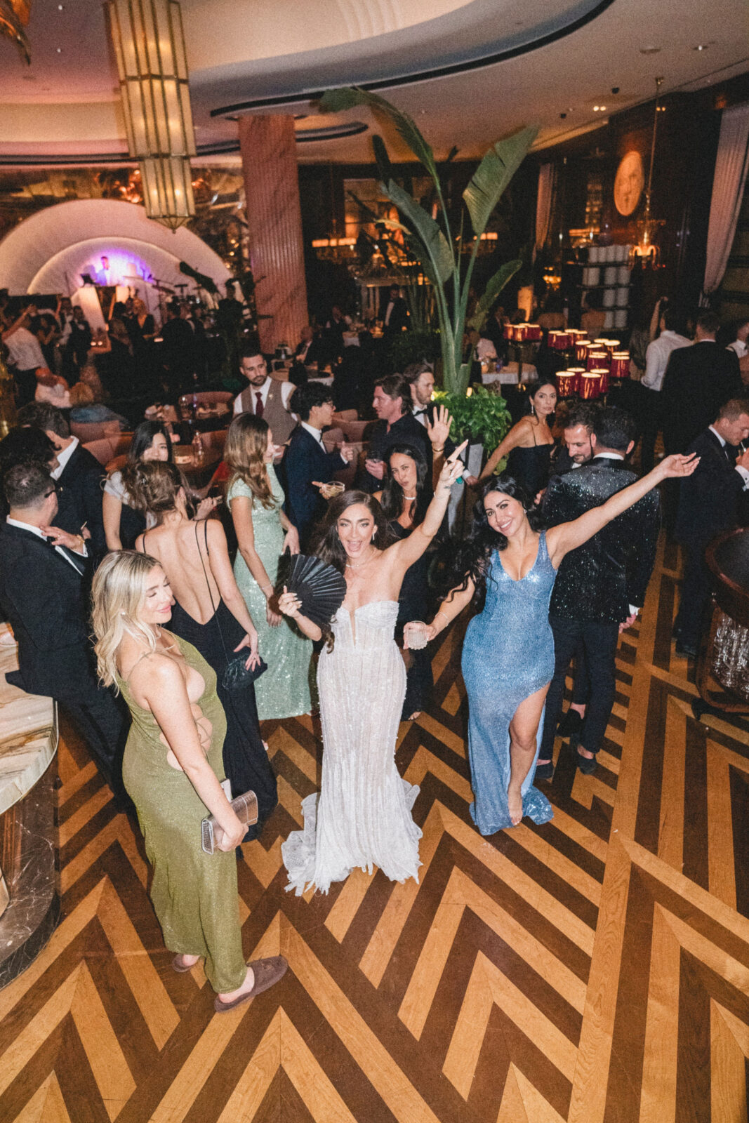 bride dancing with family