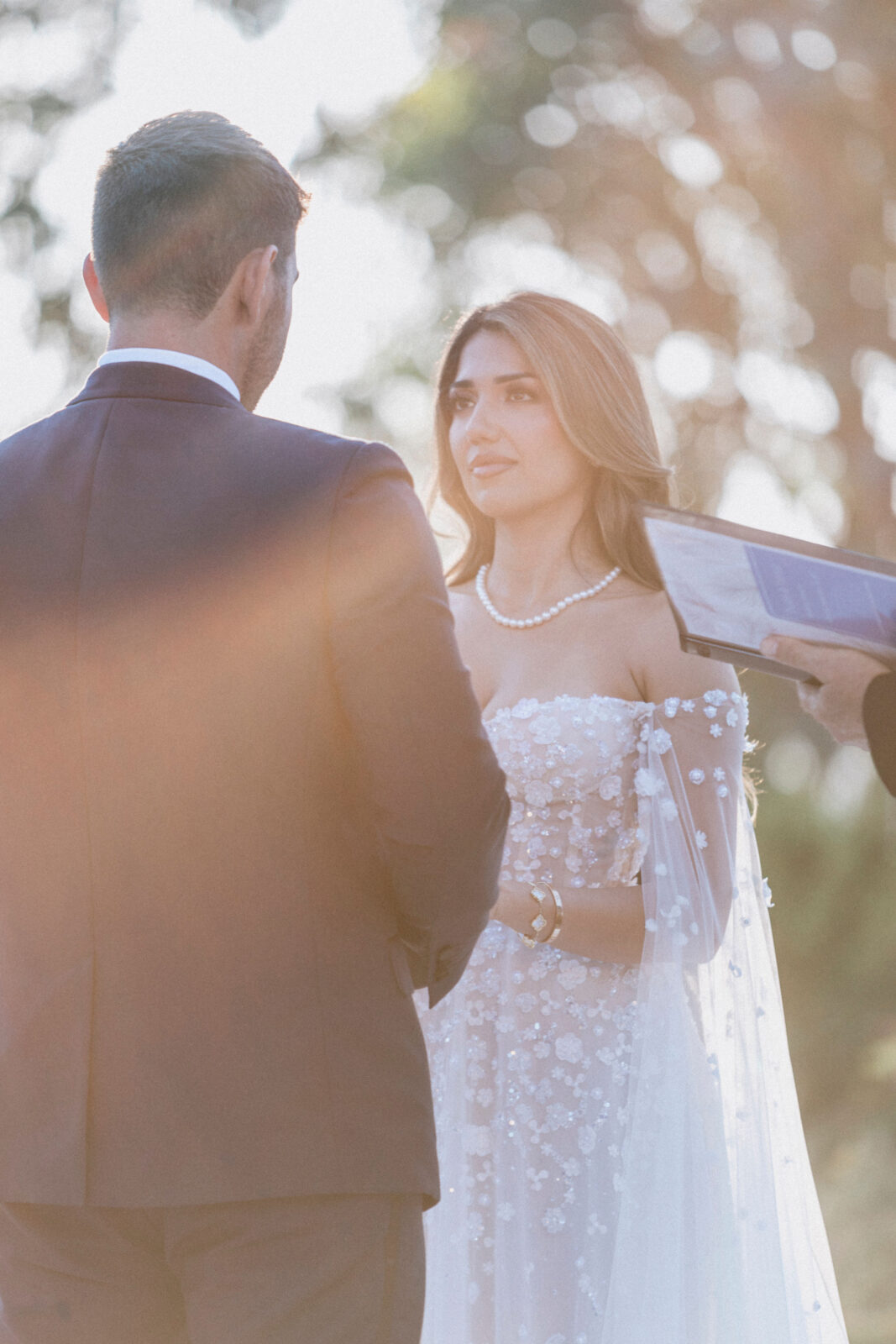 bride and groom exchanging vows