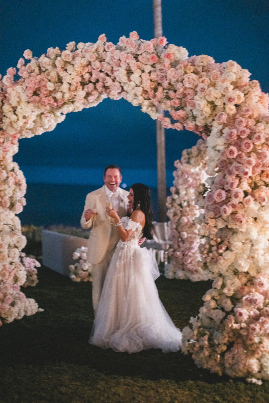 bride and groom laughing