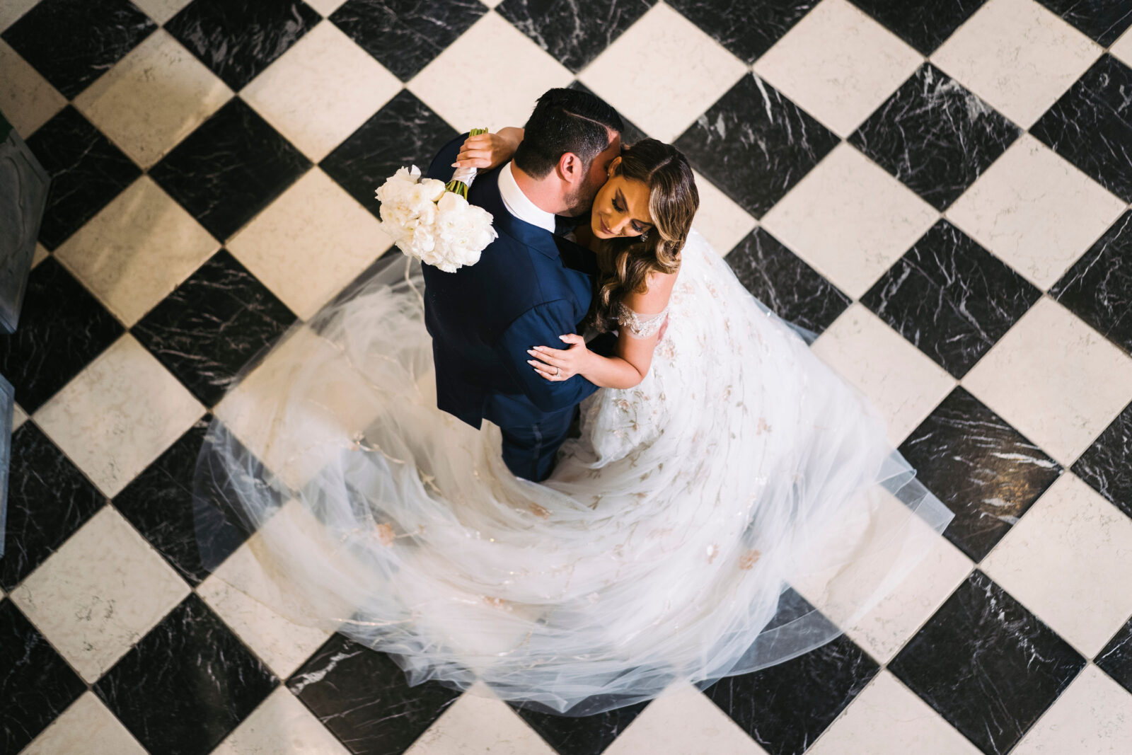 bride and groom above photo