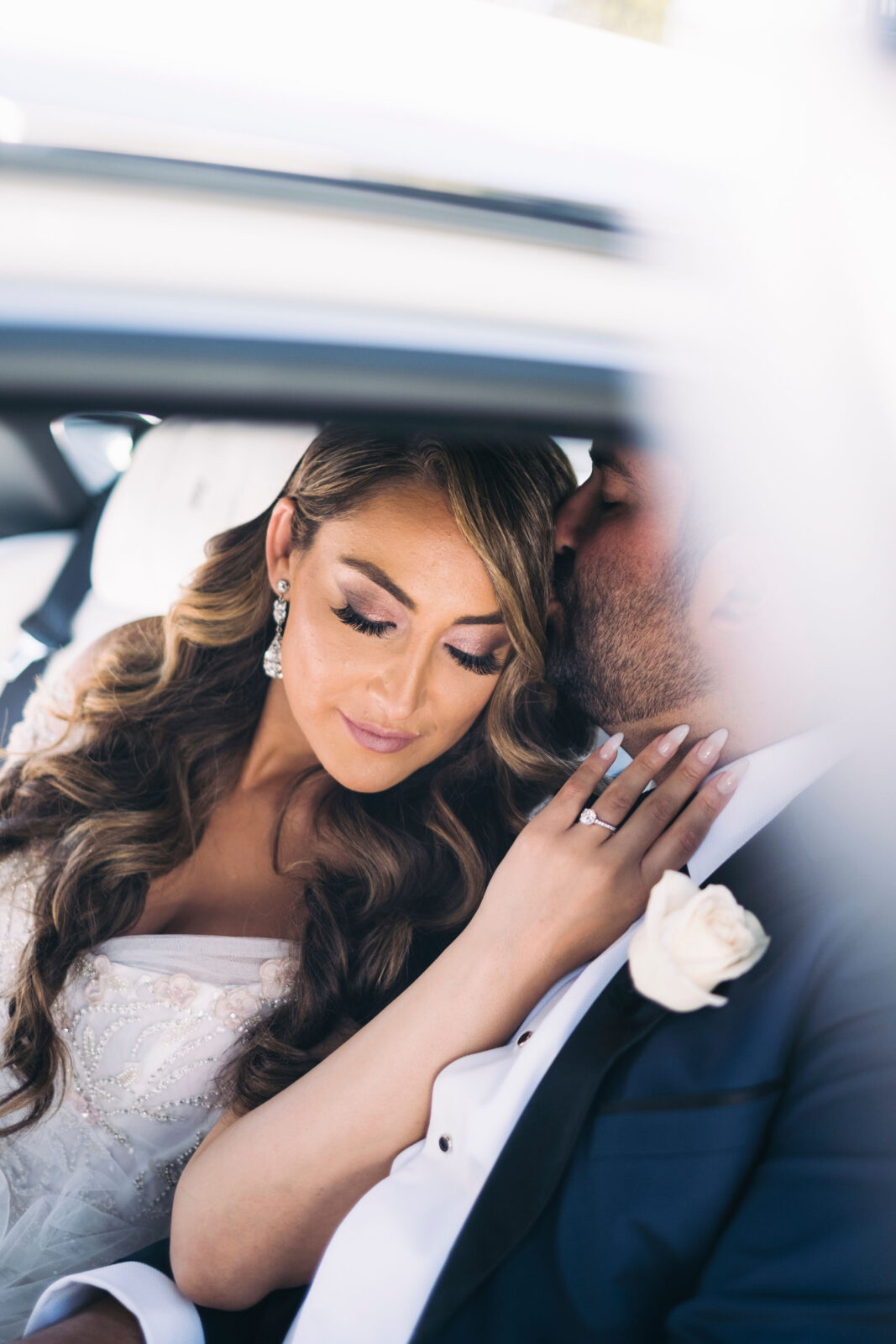 bride and groom hugging